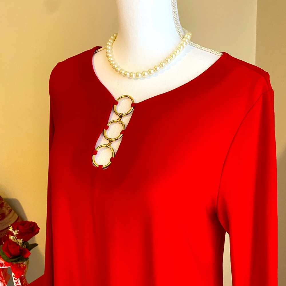 Classic frock, forgiving, sleek.  Timeless